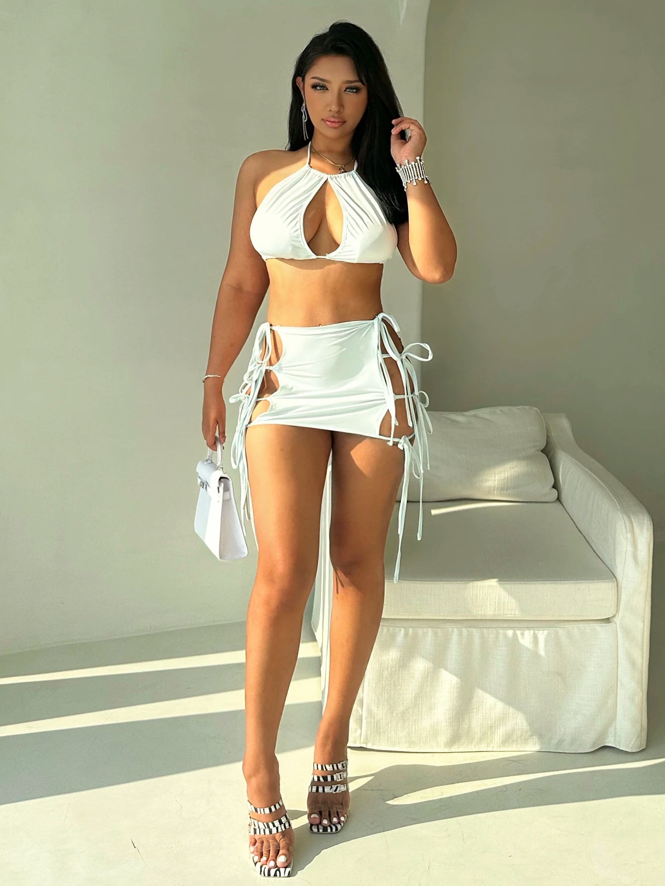 Women's sexy two-piece set with lace up off the shoulder and navel top strap up mini skirt